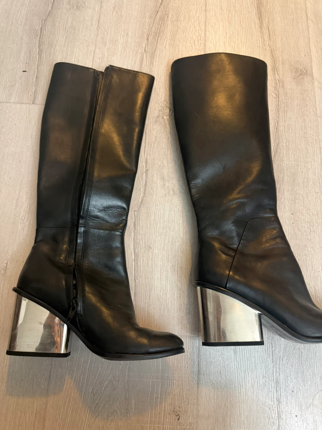 Black Leather Knee-High Boots with Metallic Heel