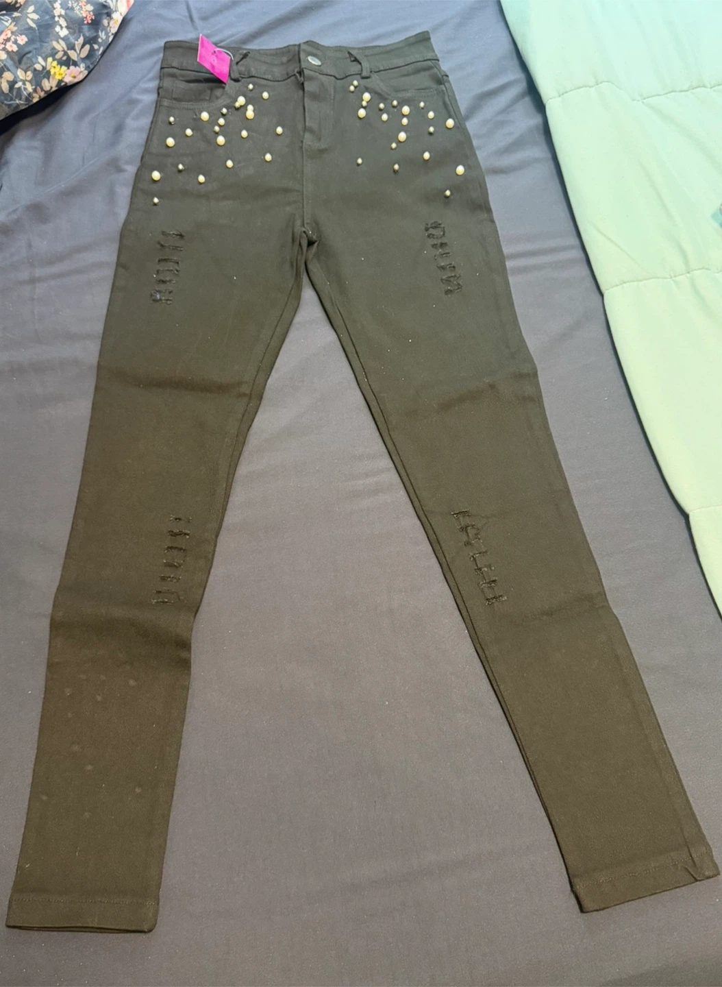 Black distressed jeans with pearls