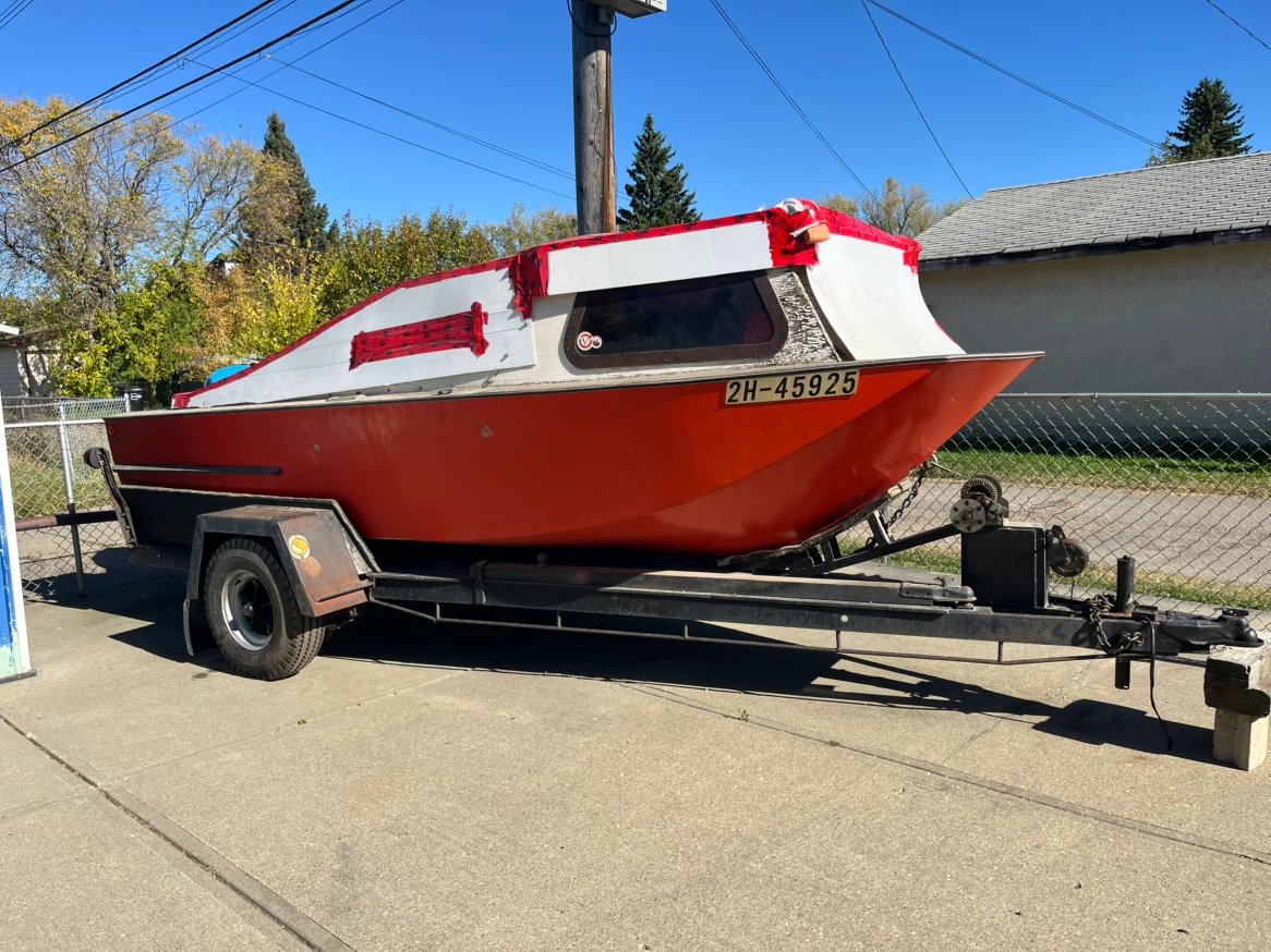 Homemade motorboat with trailer and motor