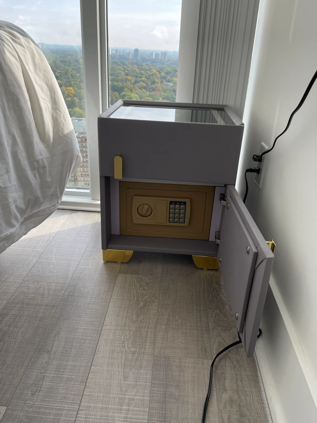 Smart nightstand with hidden safe table