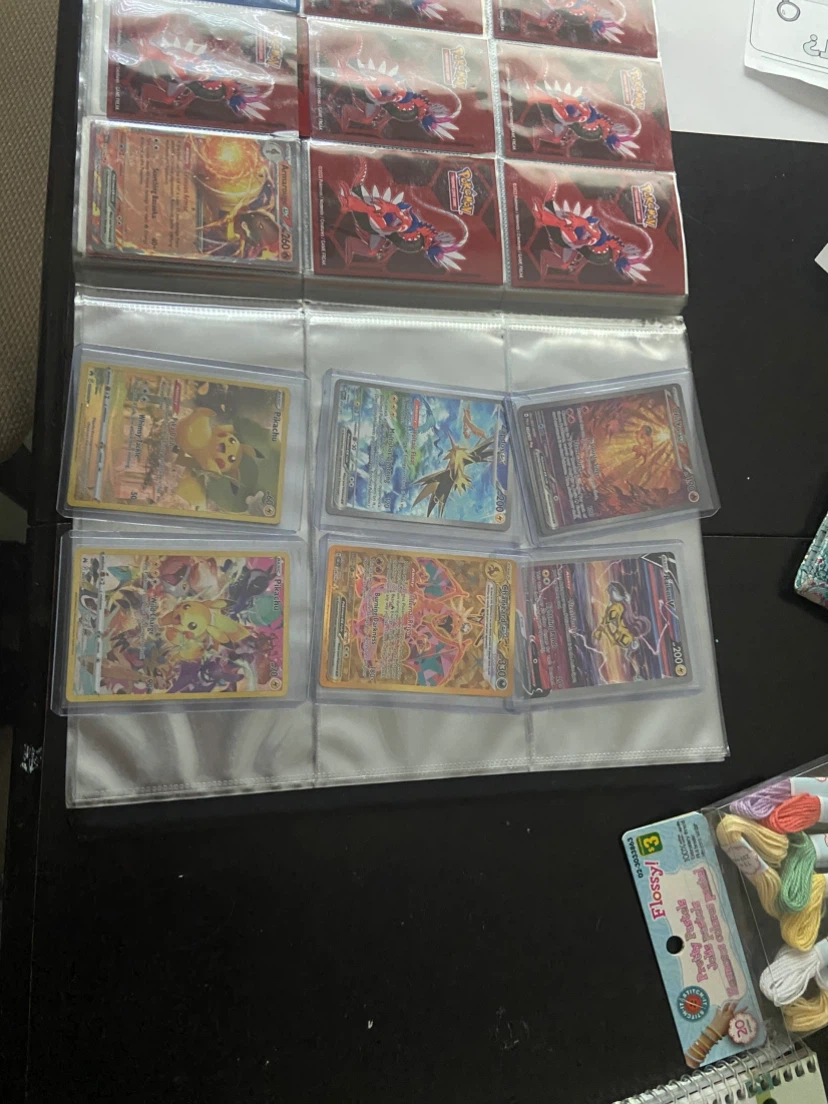 Assorted Pokemon Trading Card Collection with Binder