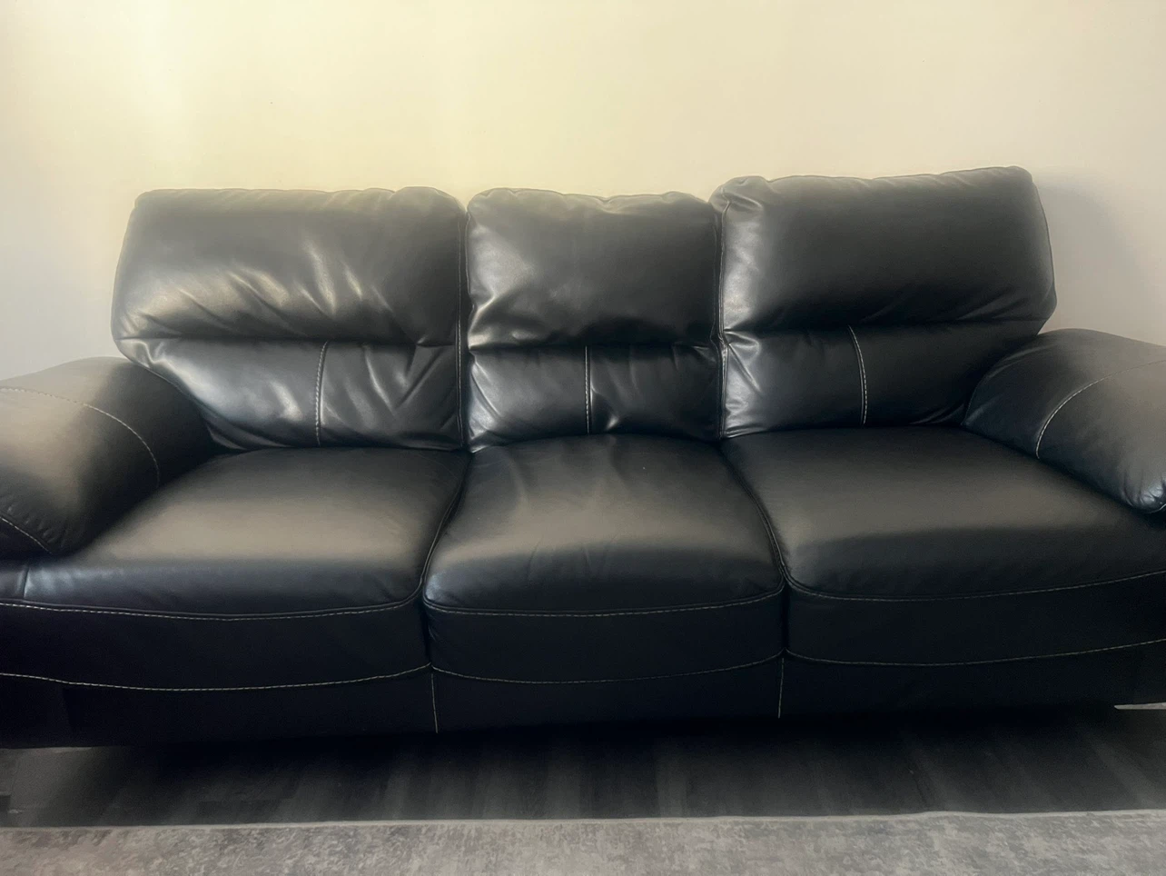 Black leather sofa and loveseat set