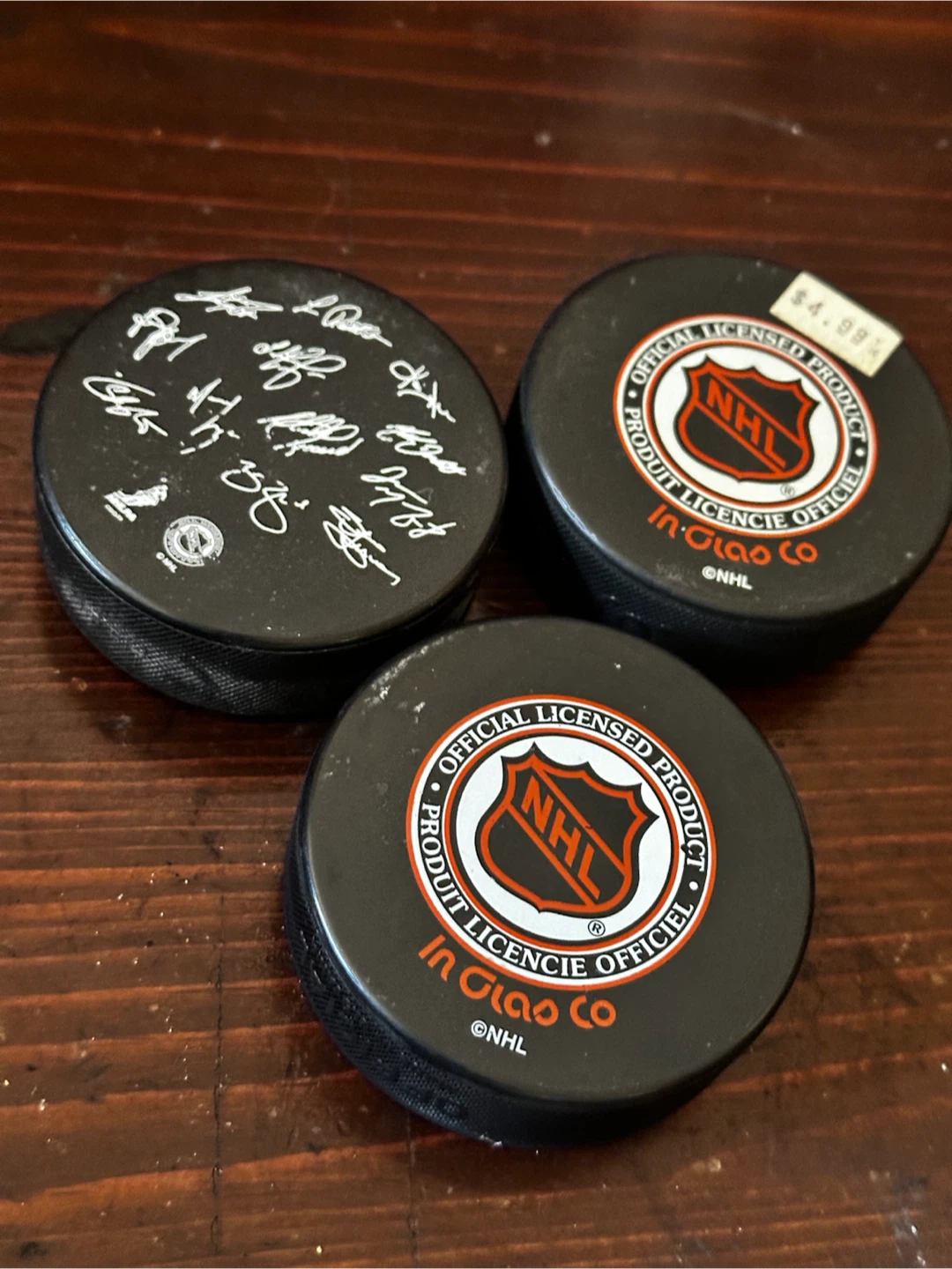 3 NHL Hockey Pucks - photo 2