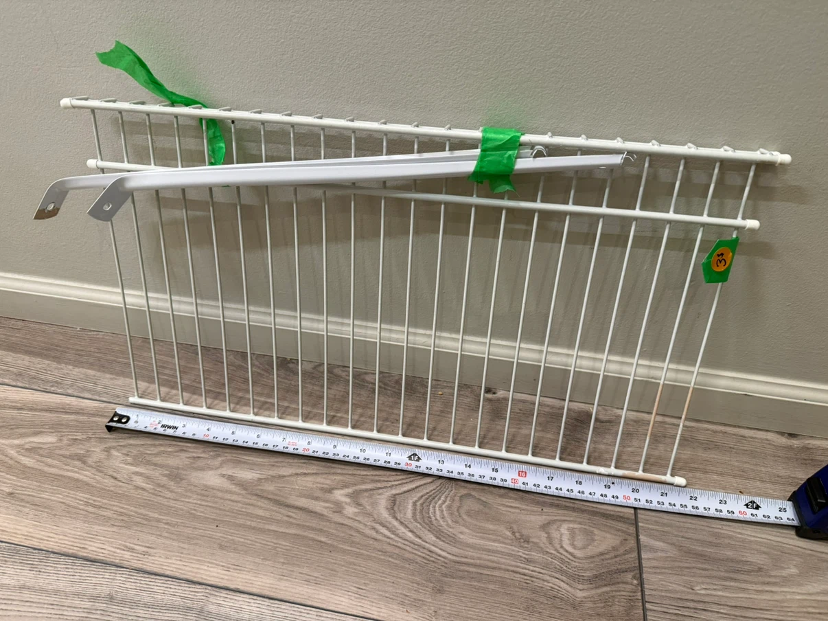 White wire rack with brackets