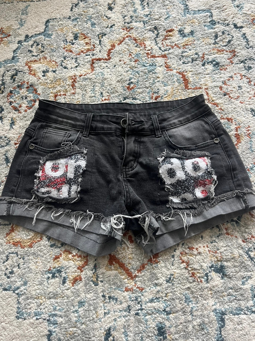 Black denim alternative shorts with sequins