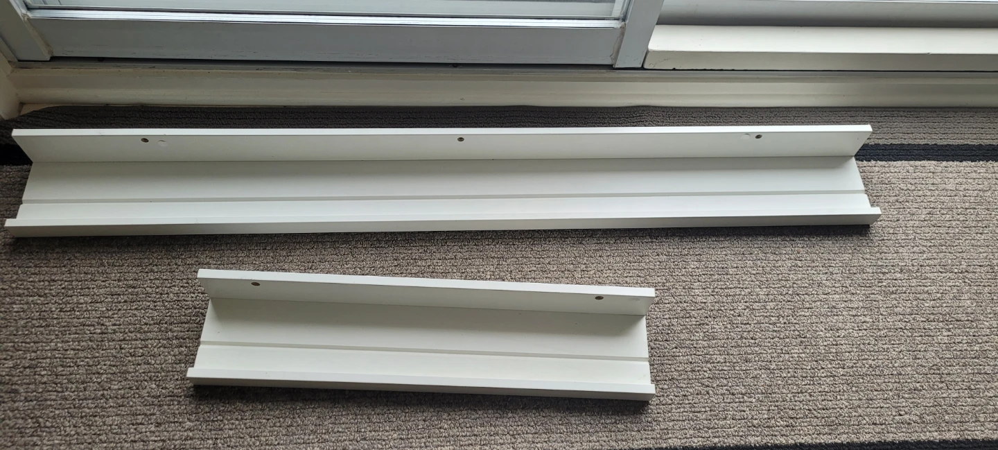 Two IKEA MOSSLANDA Picture Ledges