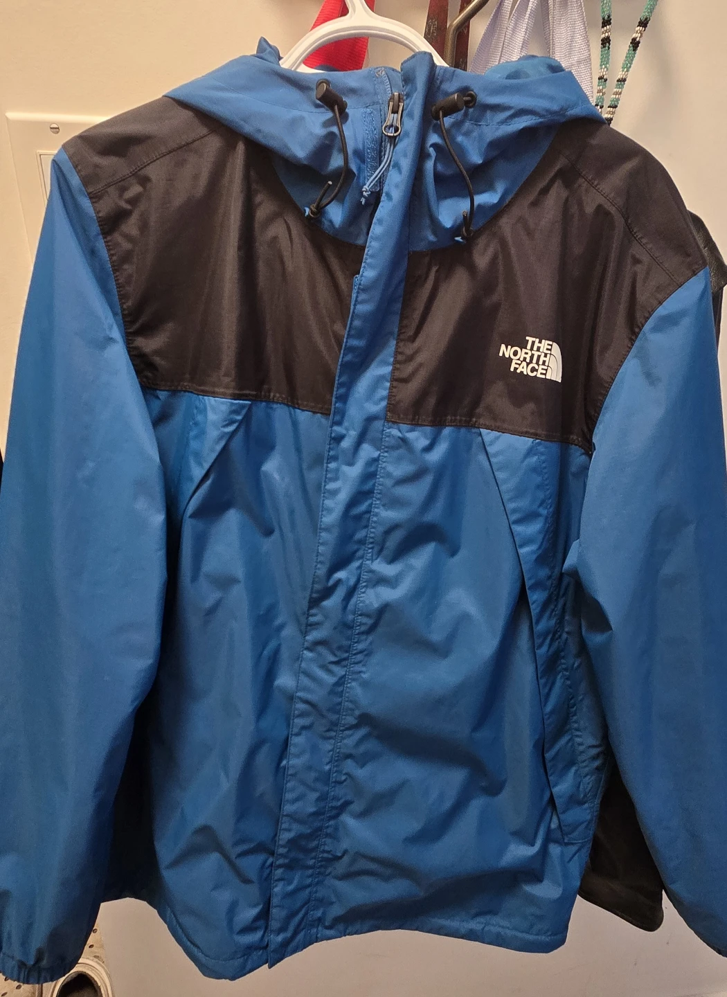 The North Face Blue and Black Rain Jacket