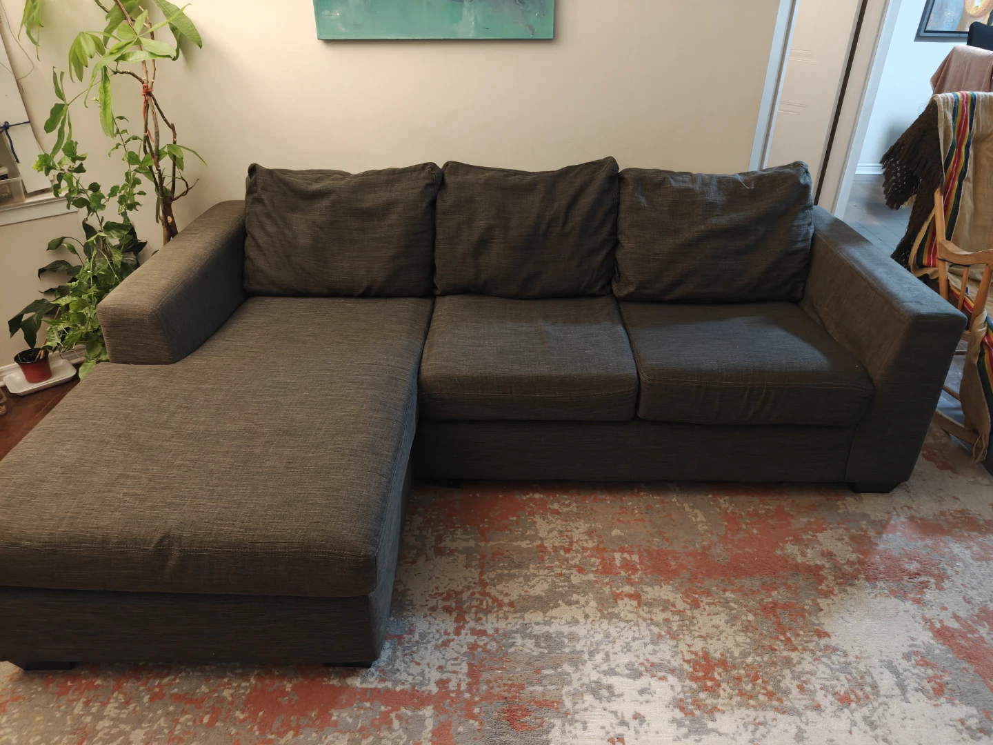 Dark grey sectional sofa with chaise