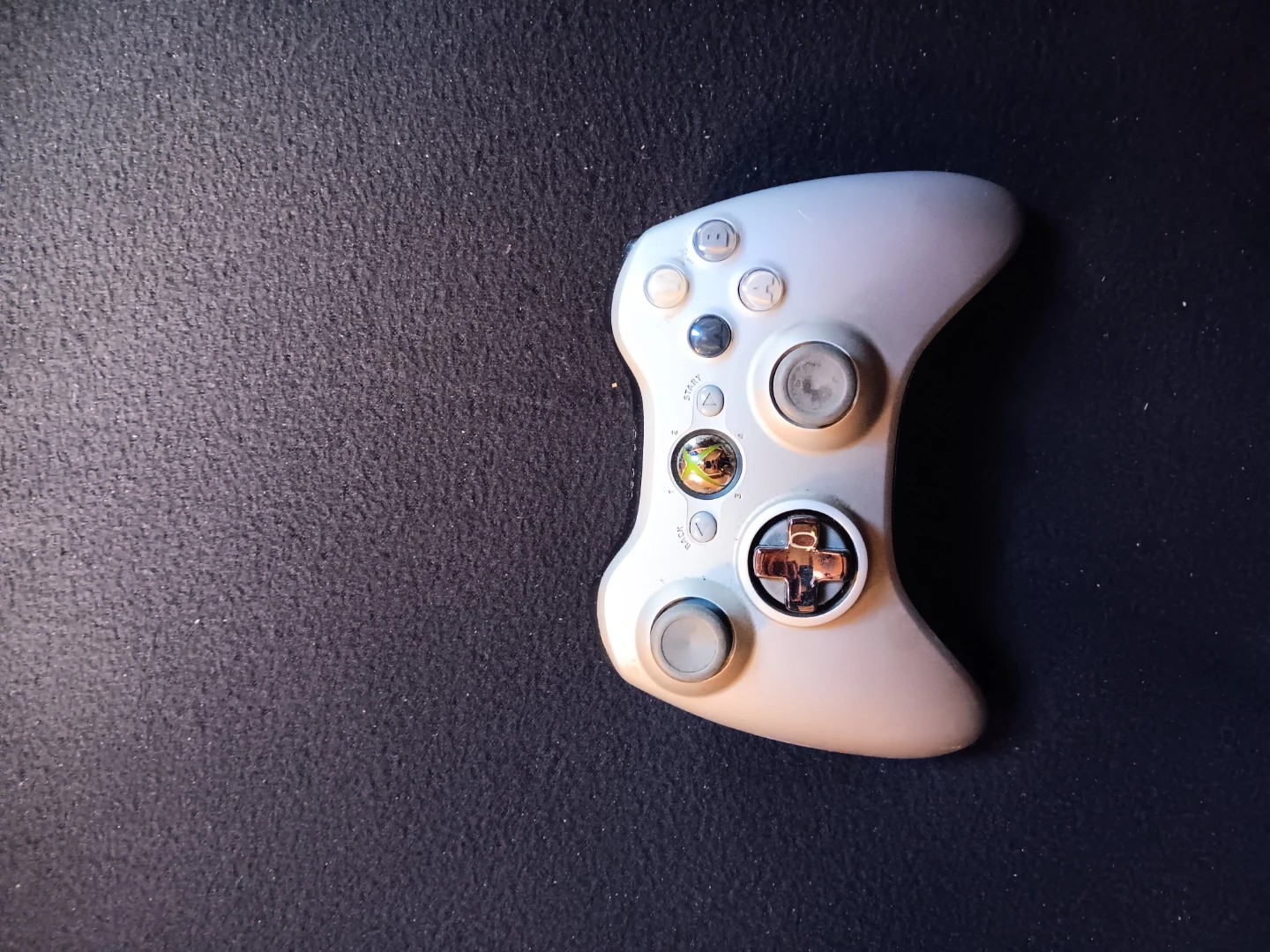 Microsoft Xbox 360 wireless controller with battery.