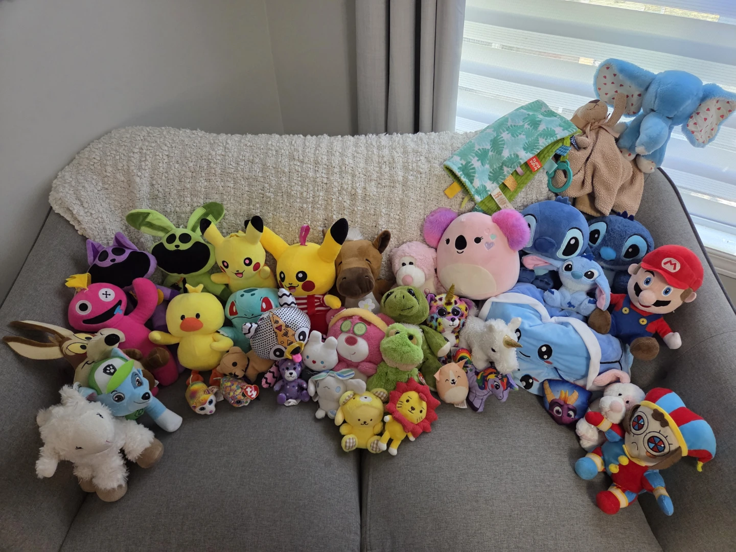 Large Collection of Assorted Plush Toys