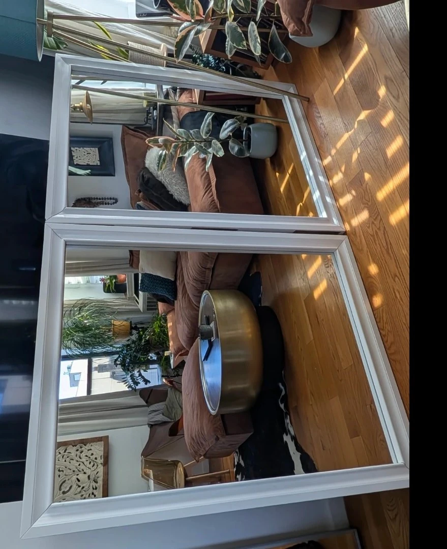 White framed large statement mirrors