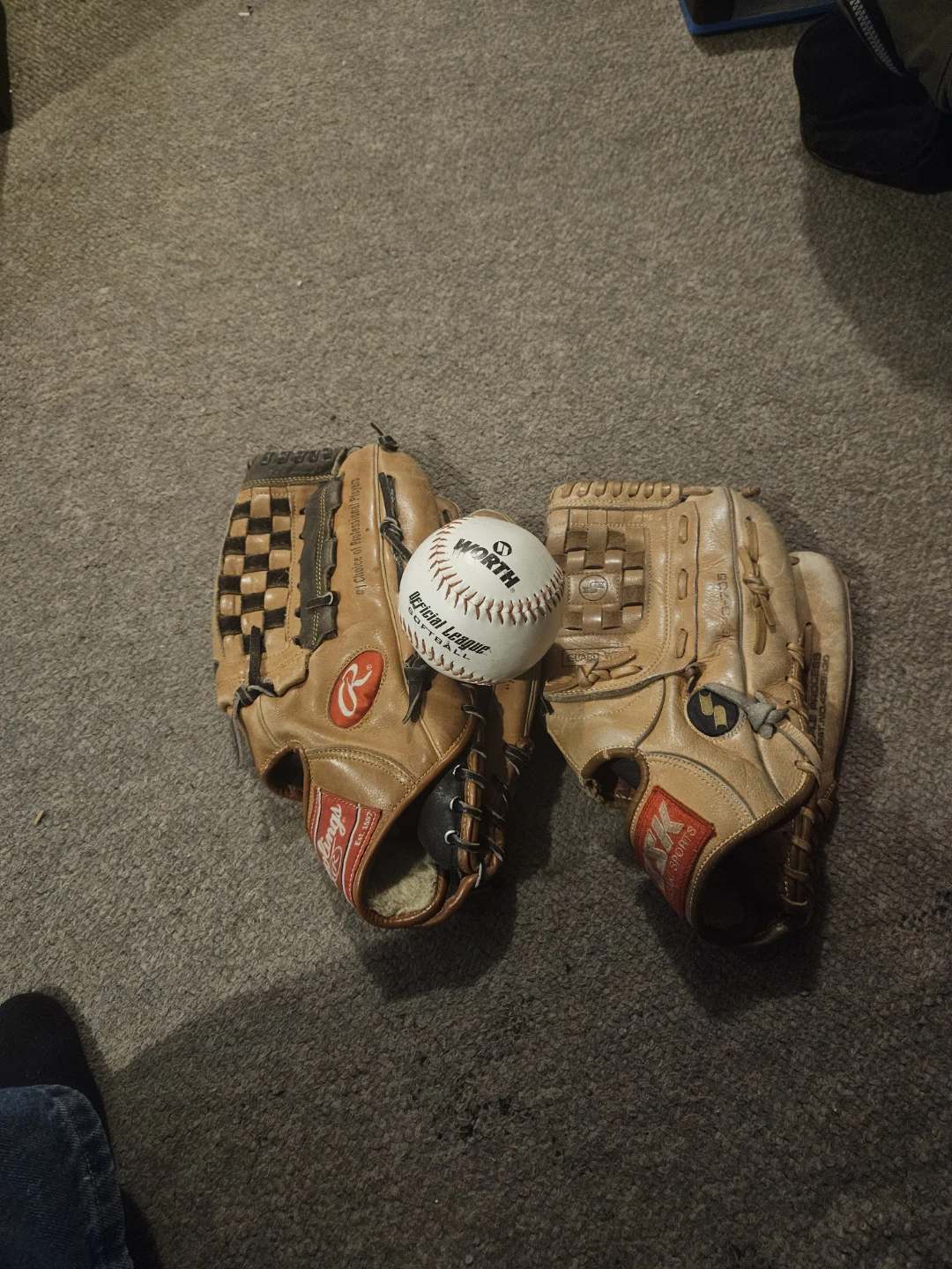 Rawlings and SK Sports baseball gloves with Worth softball