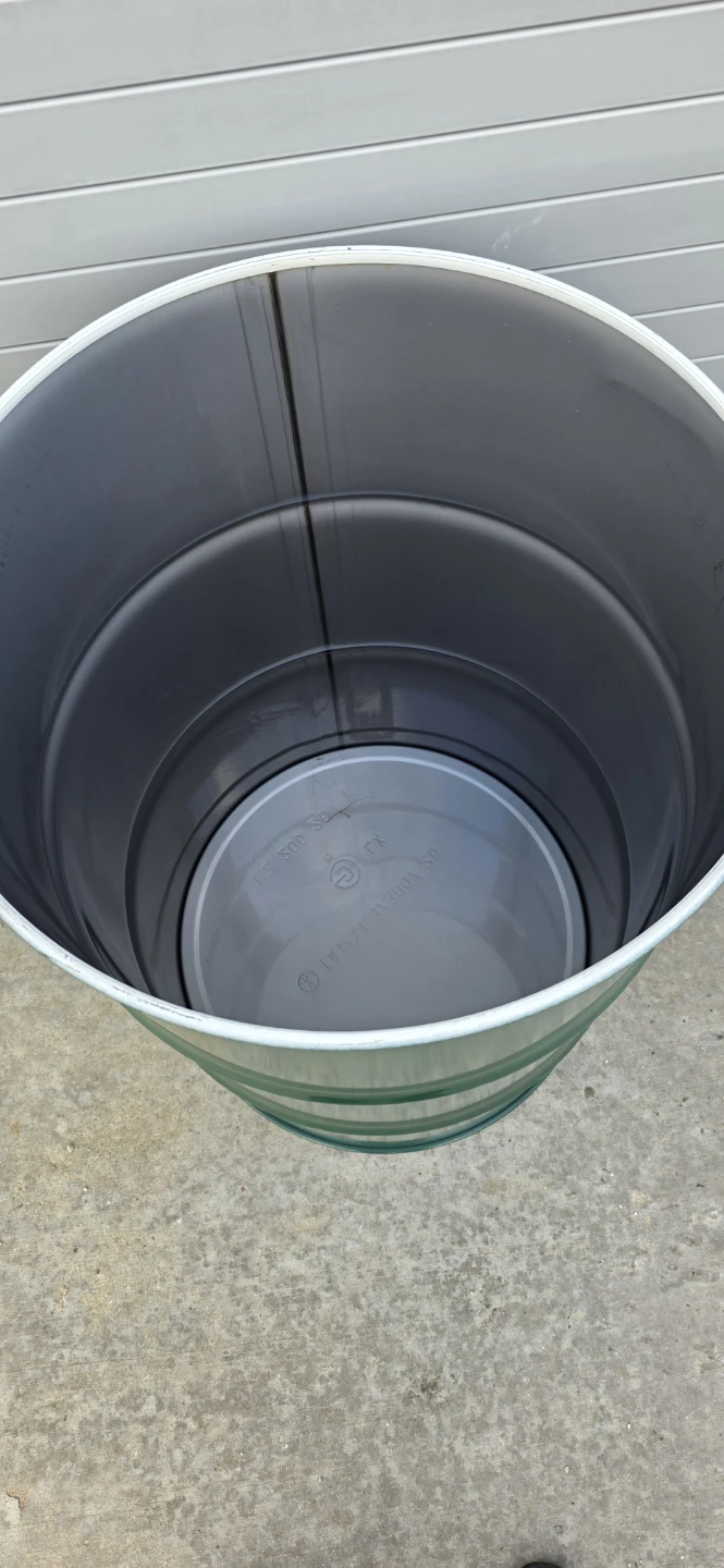 55 Gallons Steel drums with no lid/cover.