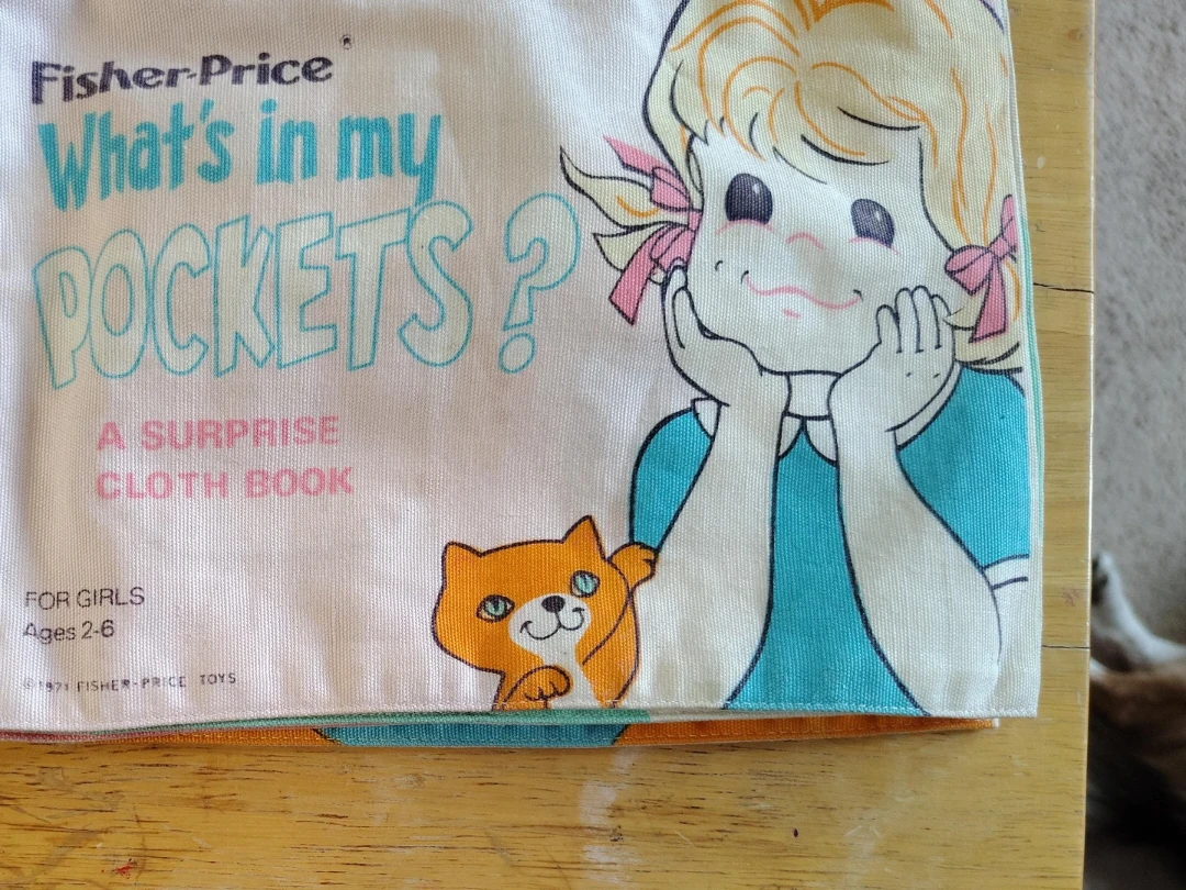 Fisher-Price What's in my Pockets? Cloth Book
