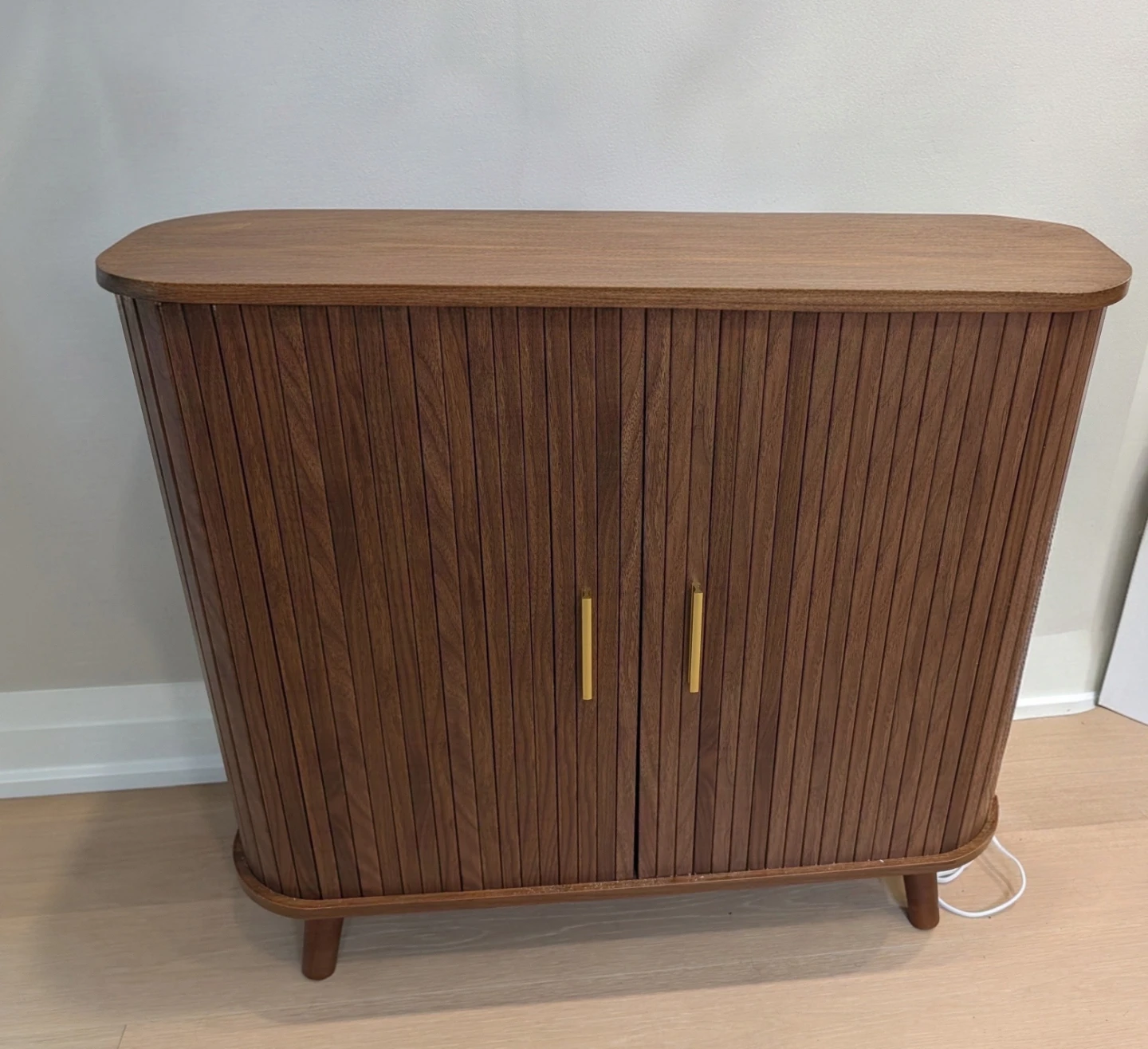 Mid-century modern style wood storage cabinet with sliding door