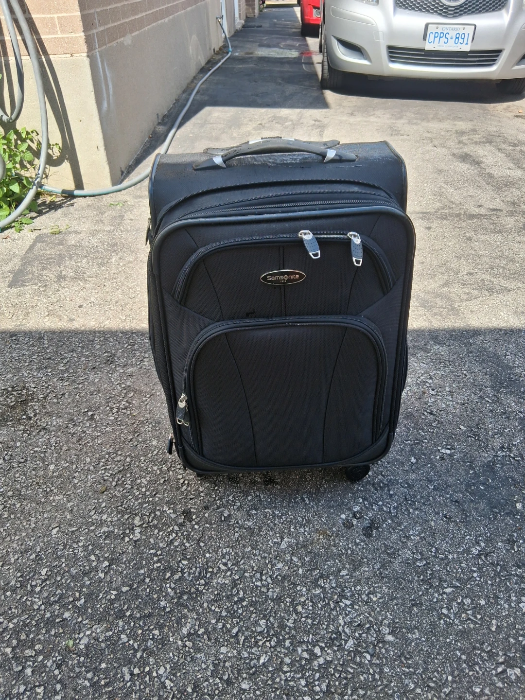 Samsonite black carry-on luggage
