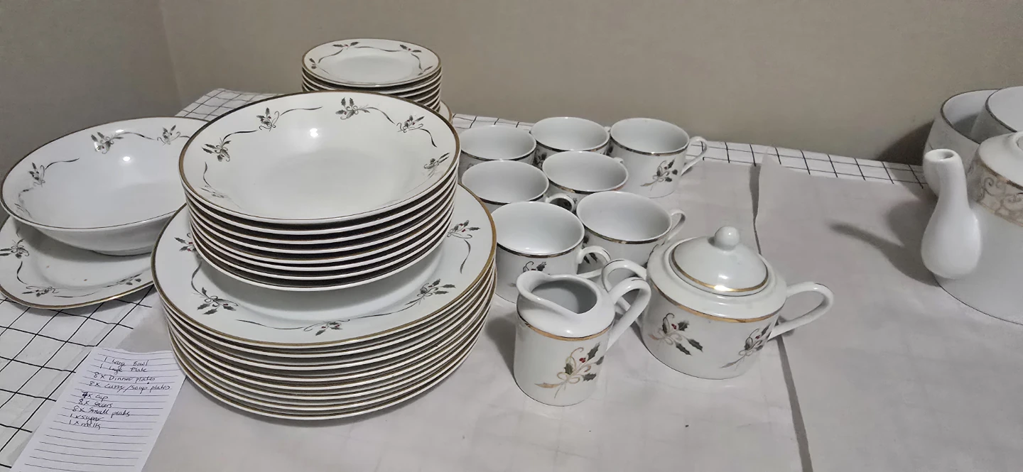 Holiday dinnerware set with gold trim