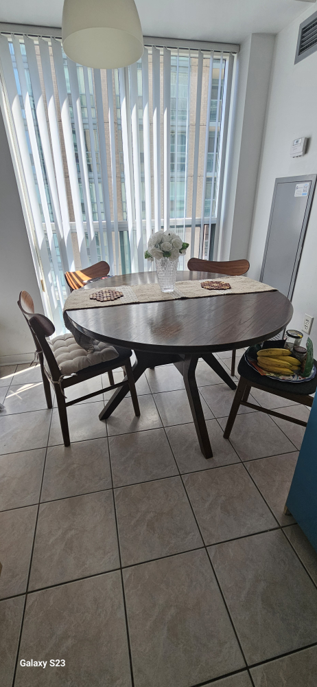 Brown wood dining table from brick