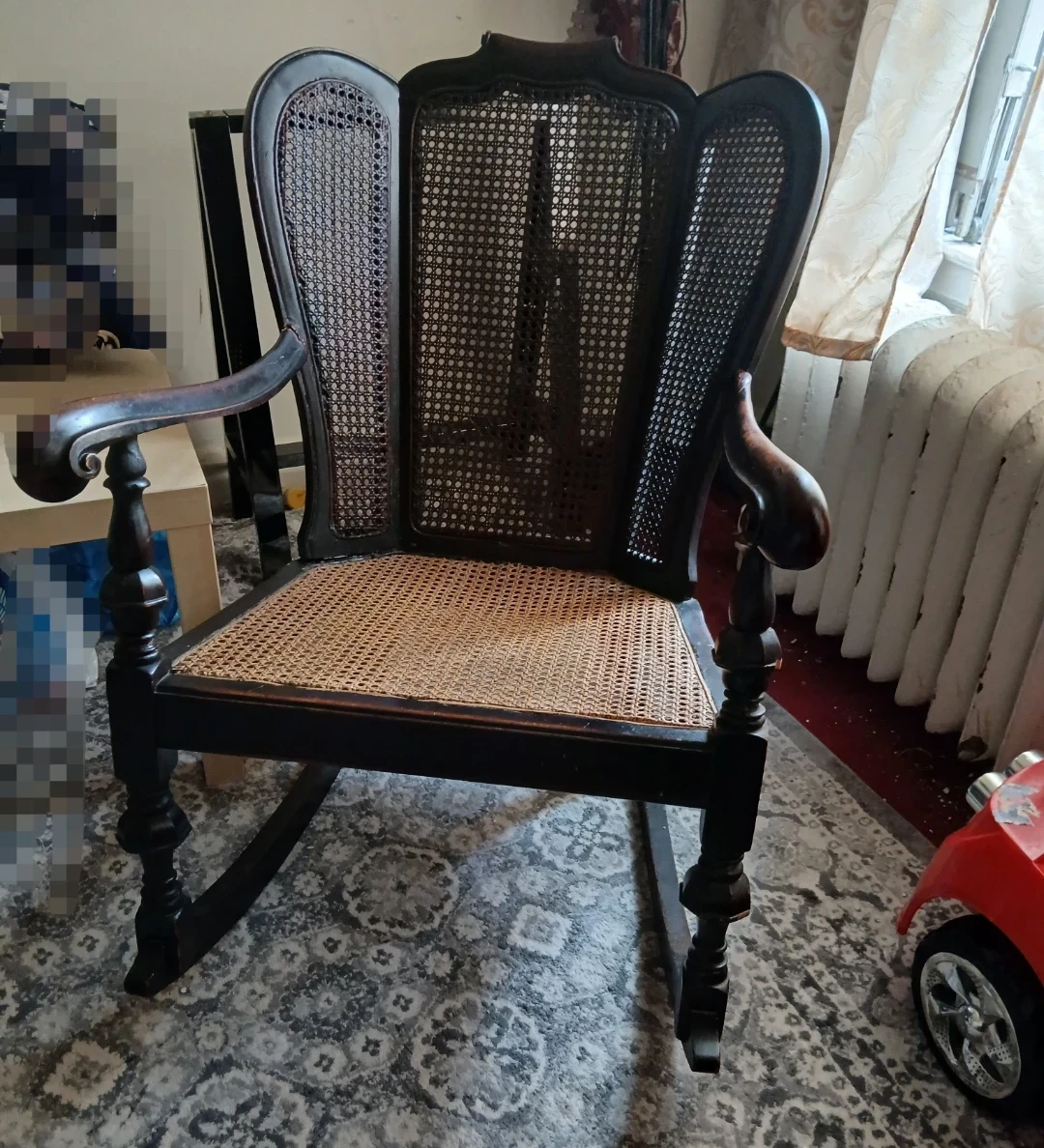 Vintage Black Wooden Rocking Chair with Cane Back and Seat