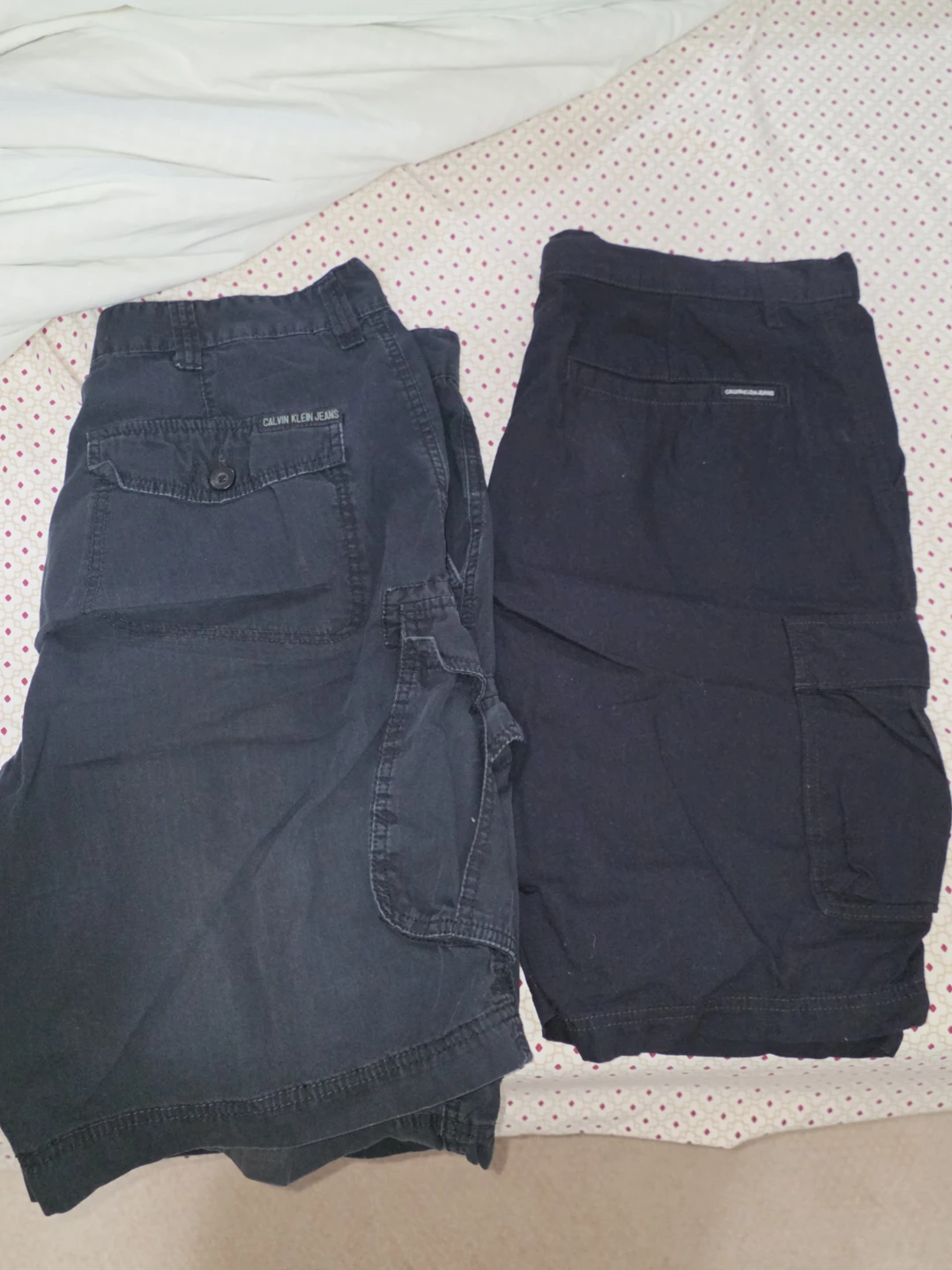 Two pairs of Calvin Klein Jeans cargo shorts