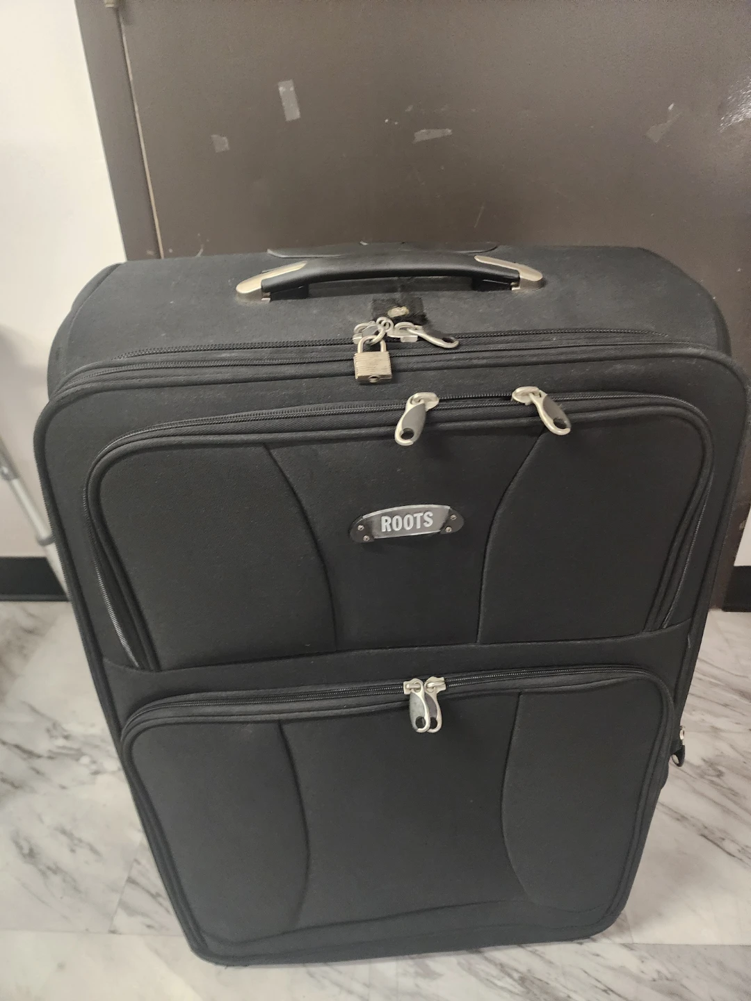 Roots black luggage suitcase