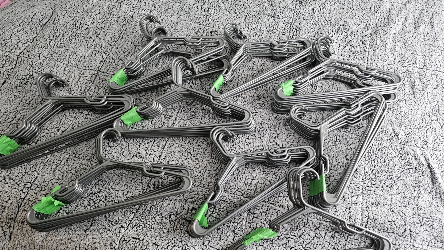 Assorted Plastic Clothes Hangers white and grey