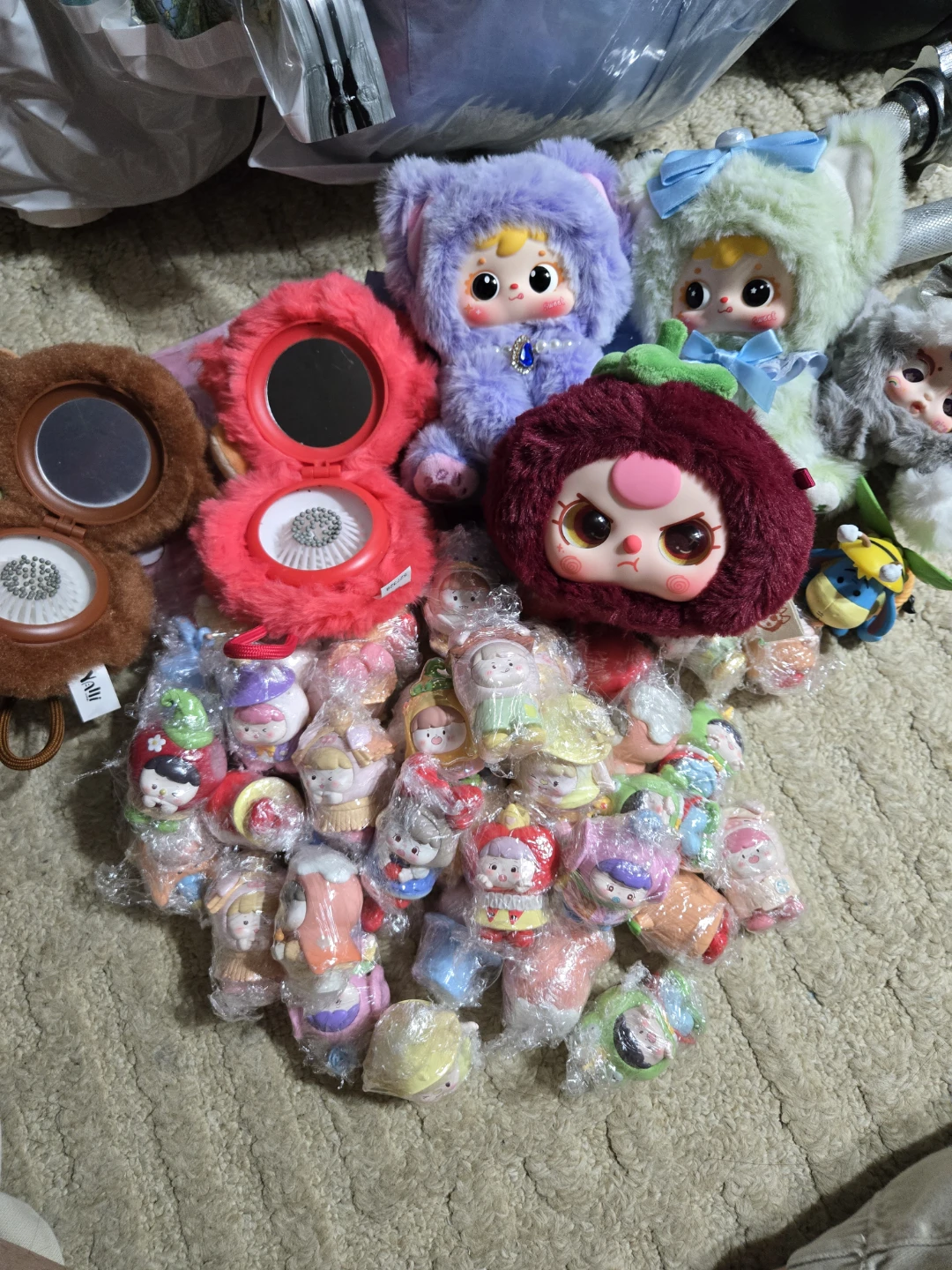 Assorted Pop Mart Blind Box Figures and Compact Mirrors