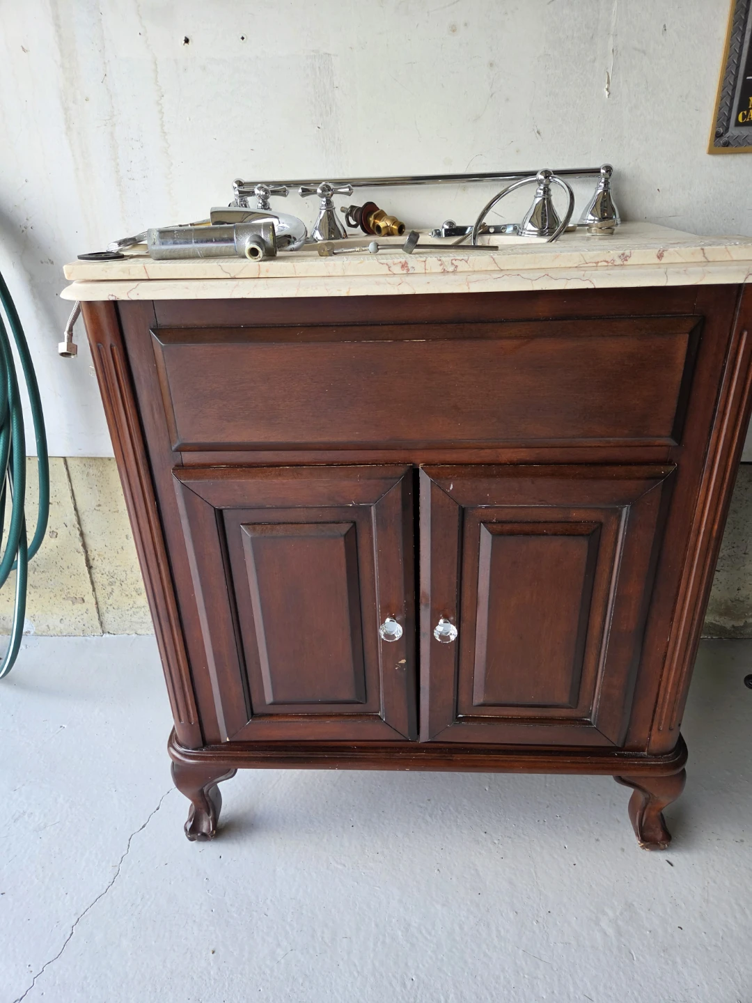 Bathroom vanity and faucet