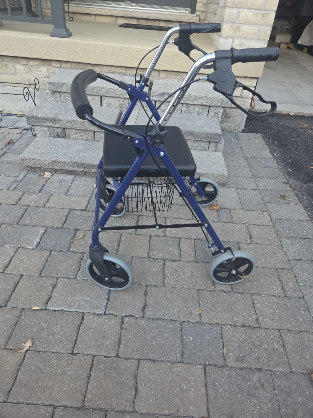 Blue Rolling Walker with Seat and Basket