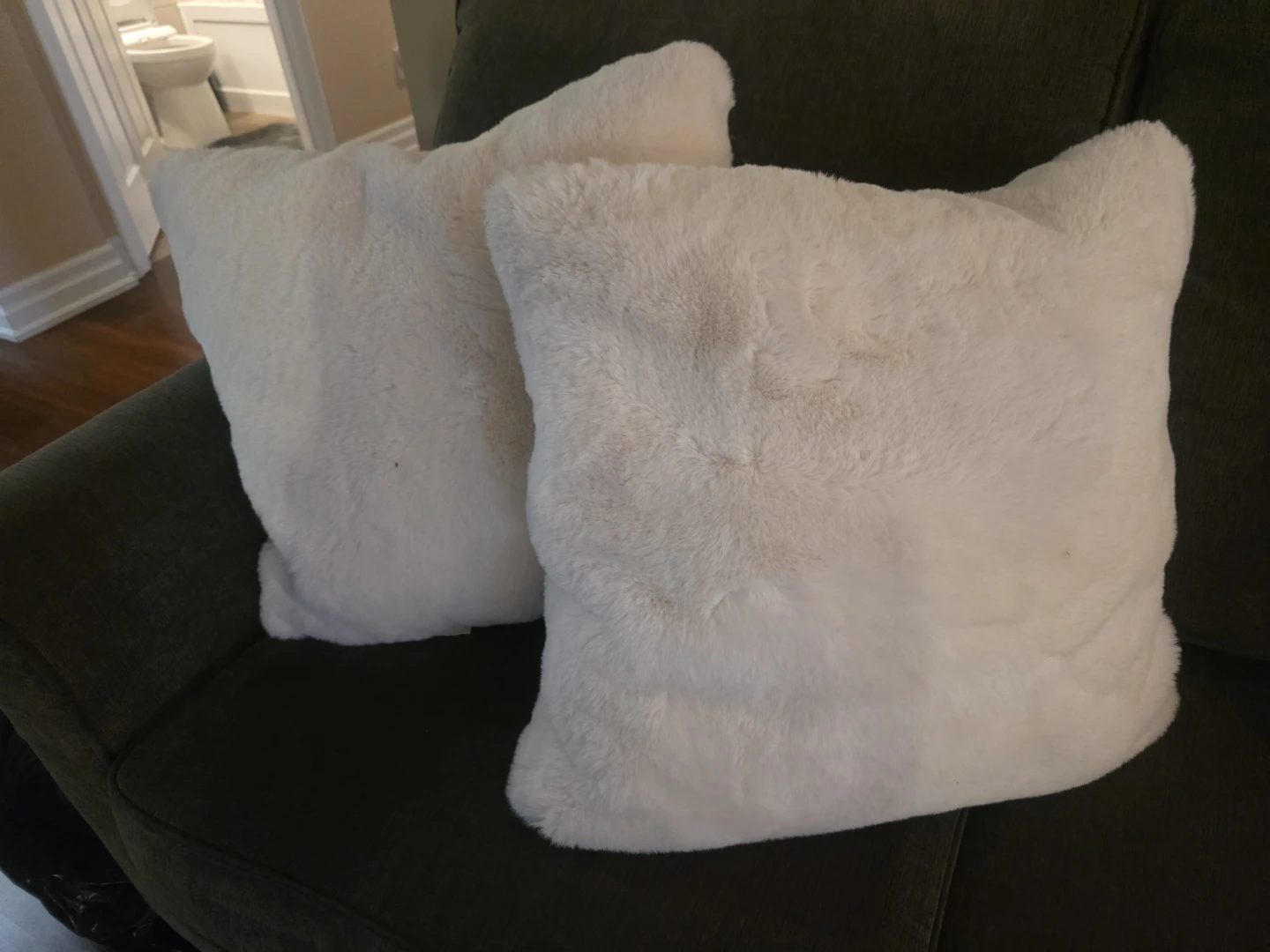 Two White Faux Fur Cushions