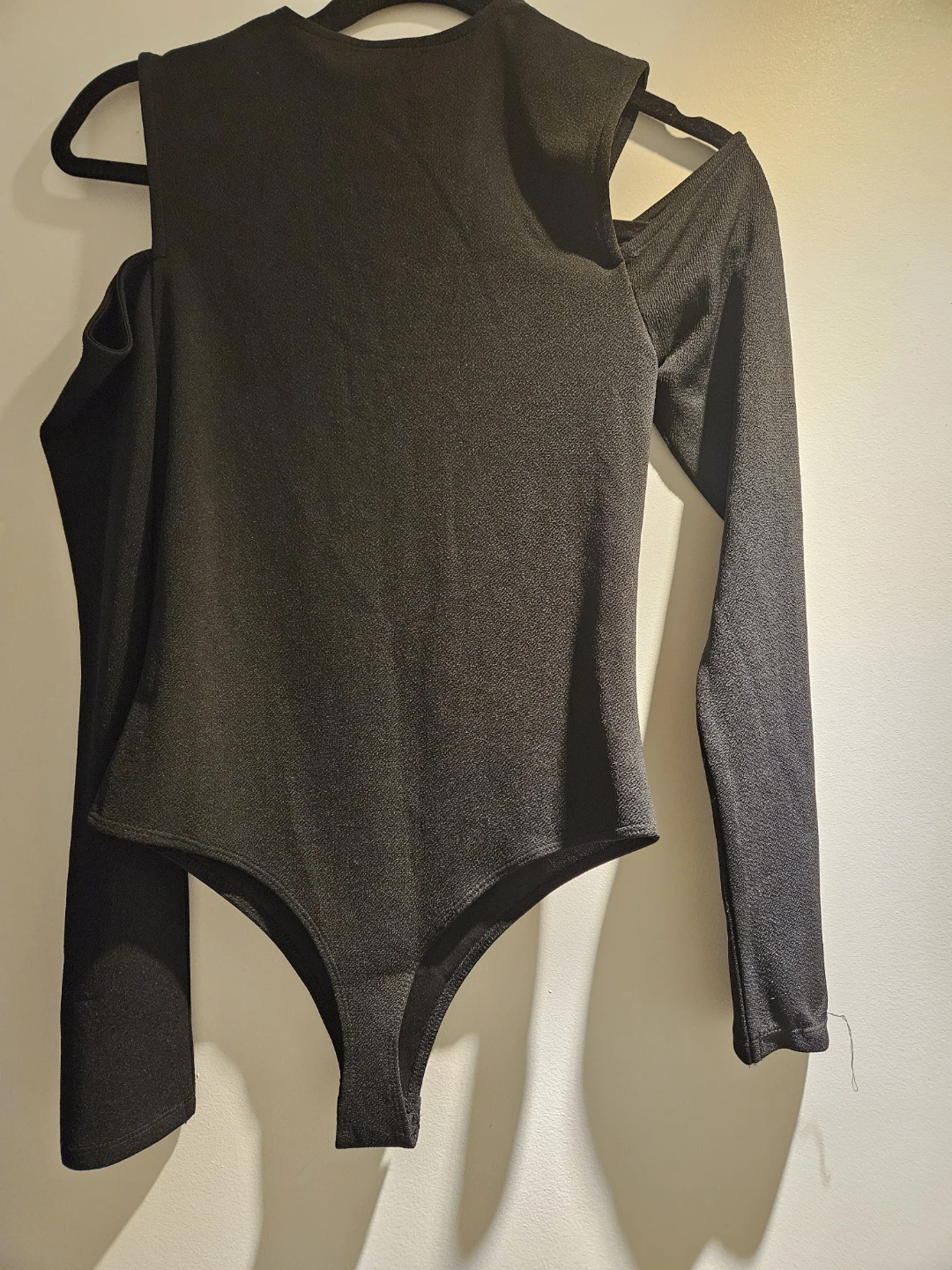 Black cold-shoulder long sleeve bodysuit