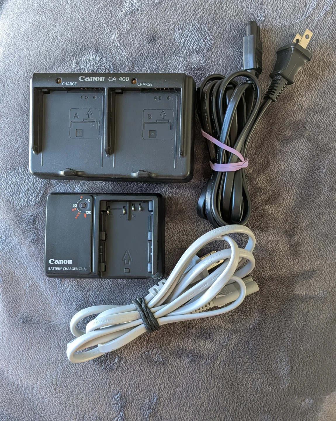 Assorted Canon Camera Battery Chargers and Adapters - photo 2