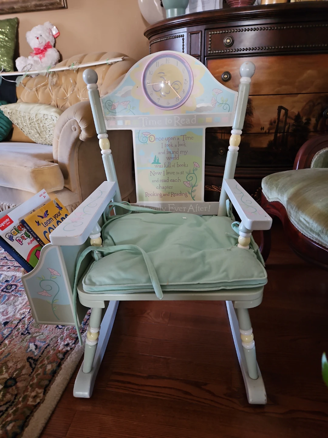 Children's wooden rocking chair with book storage