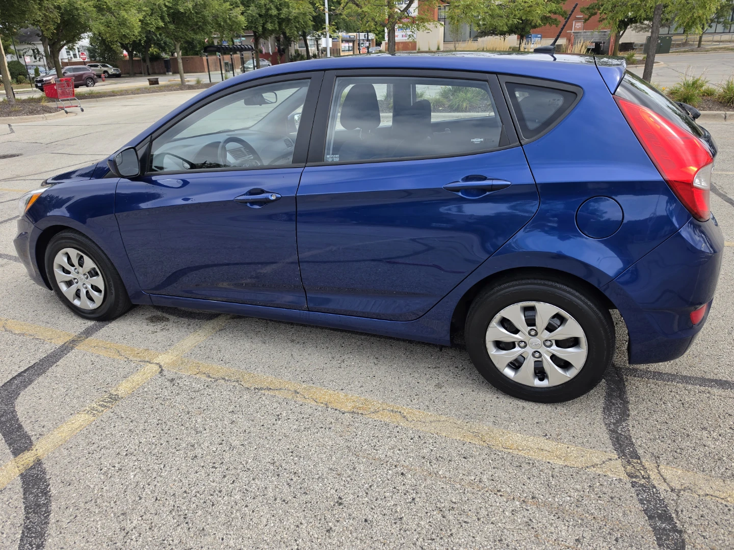 Blue Hyundai Accent Hatchback - photo 5