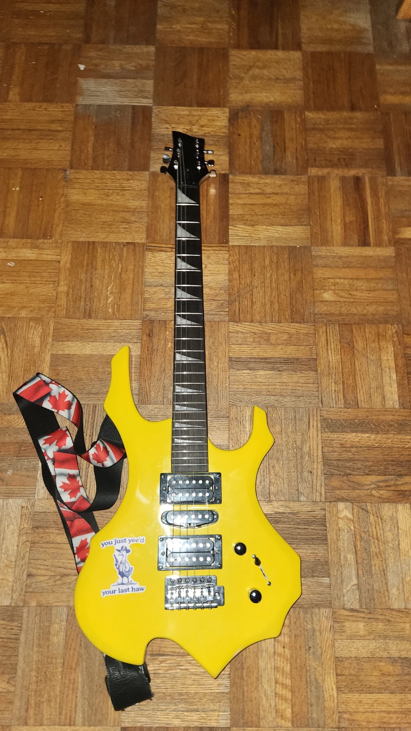Yellow Electric Guitar with Canadian Strap