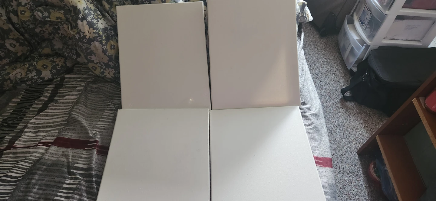 Four Blank White Canvases