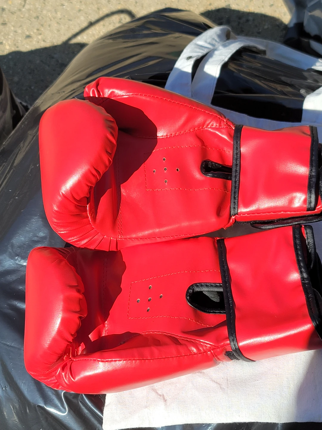Pair of red boxing gloves