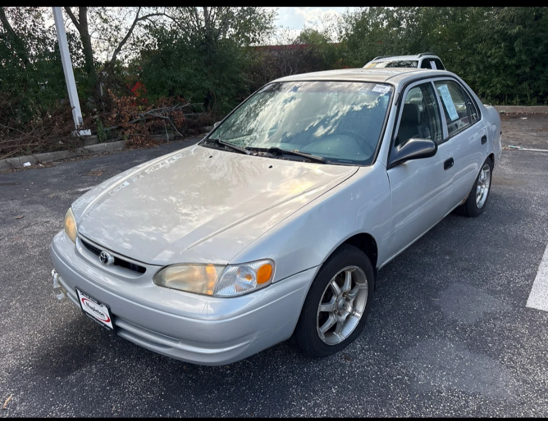 Silver 1999 Toyota Corolla CE Sedan