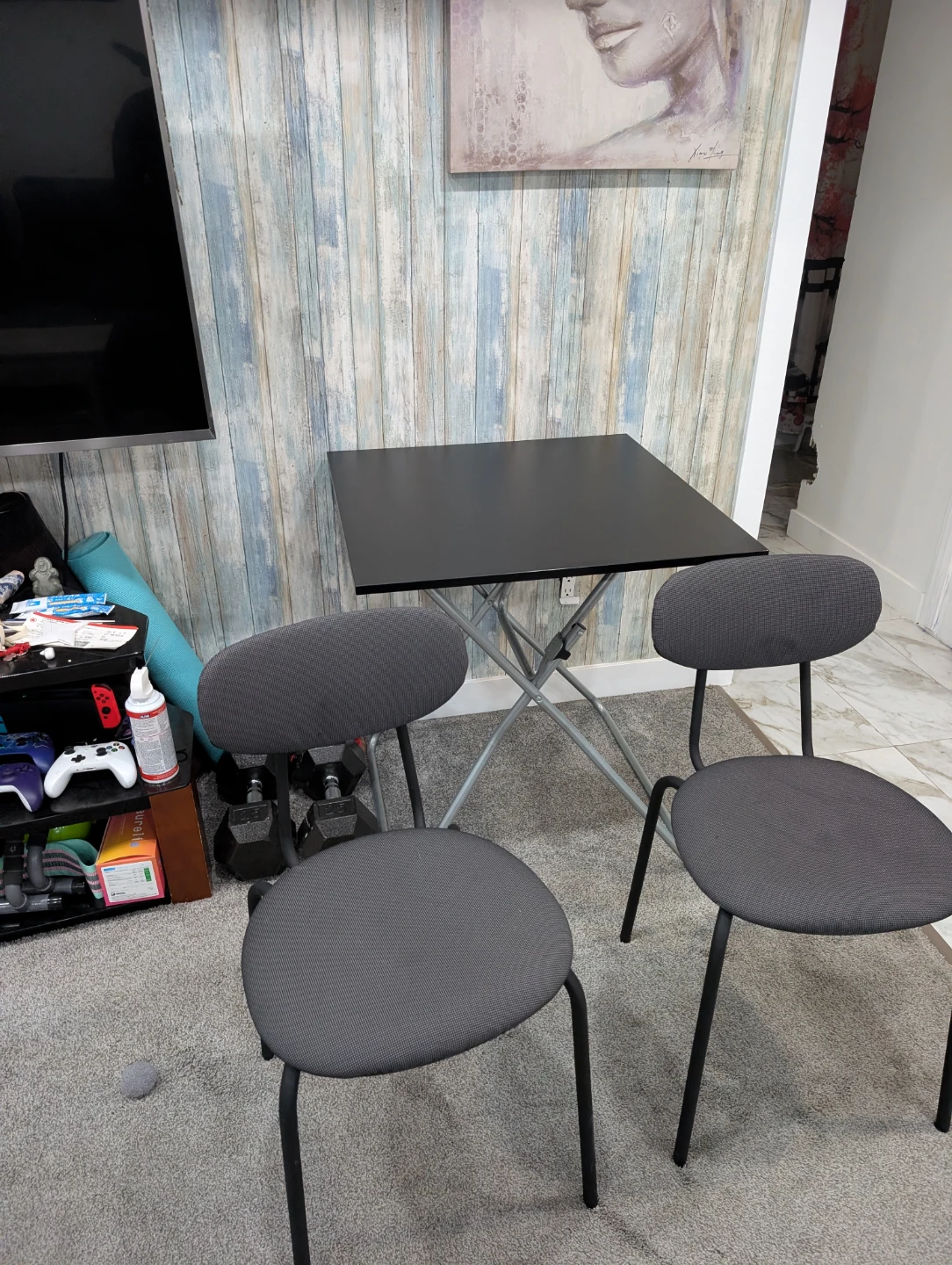 Black Folding Ikea Table and Two Chairs