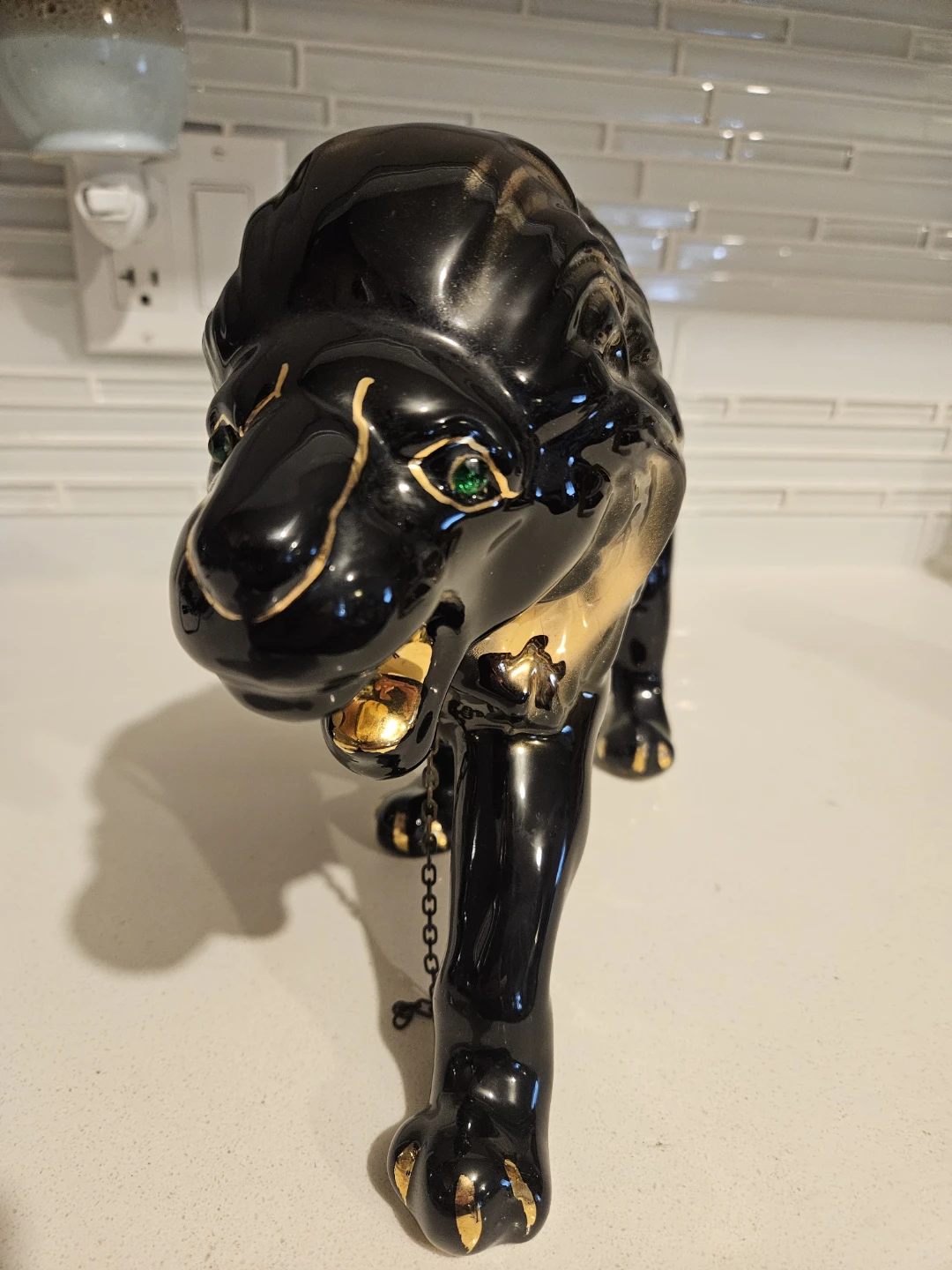 Striking black-and-gold ceramic lion - photo 3