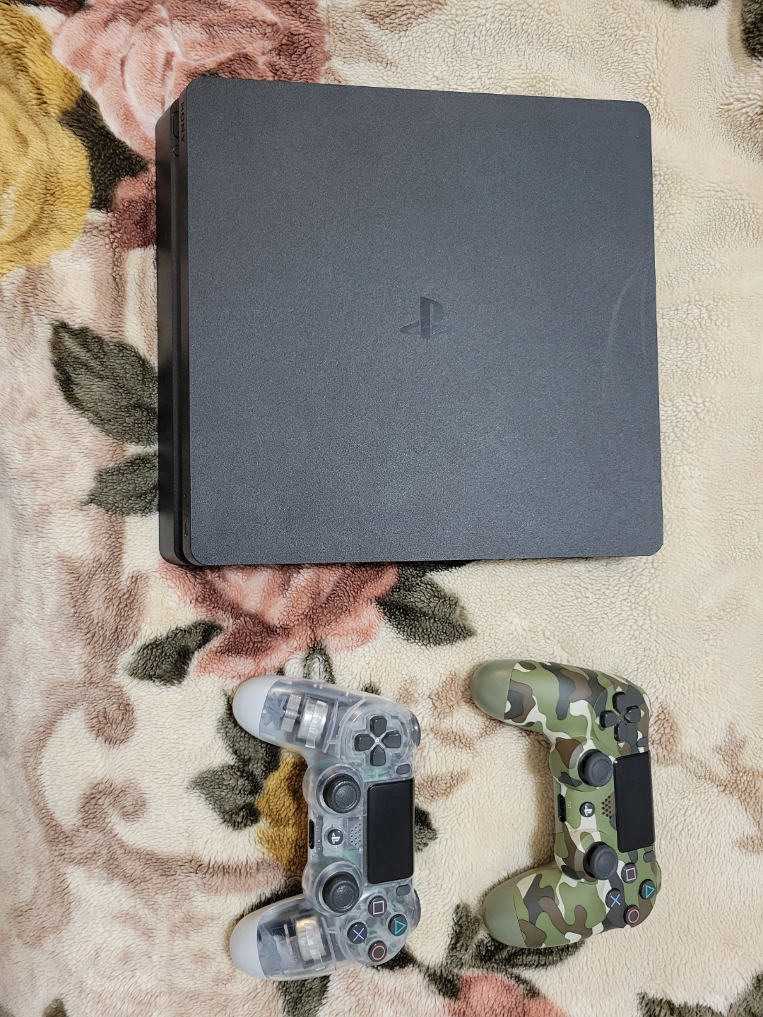 Sony PlayStation 4 Slim Console with 2 Controllers