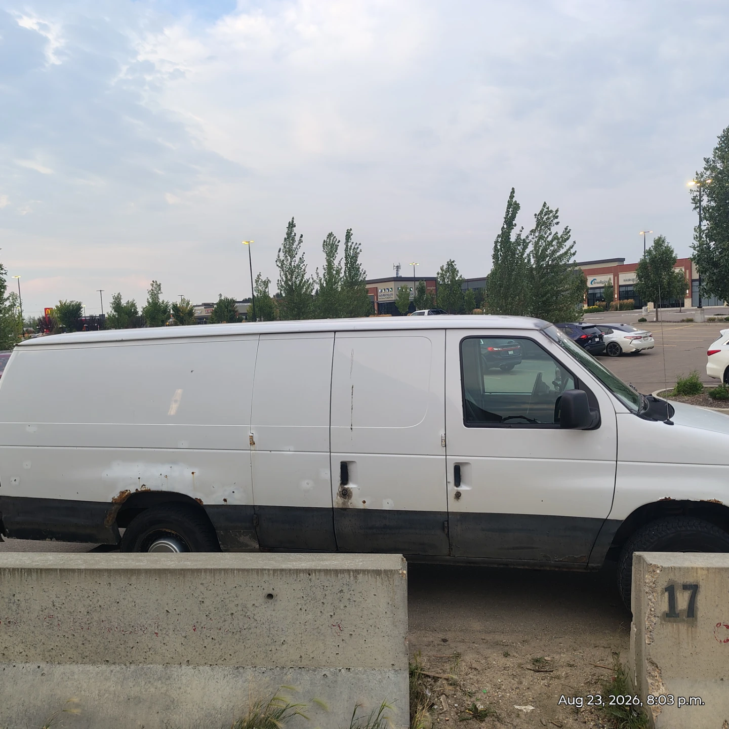 White Ford E-350 Super Duty Cargo Van - photo 3