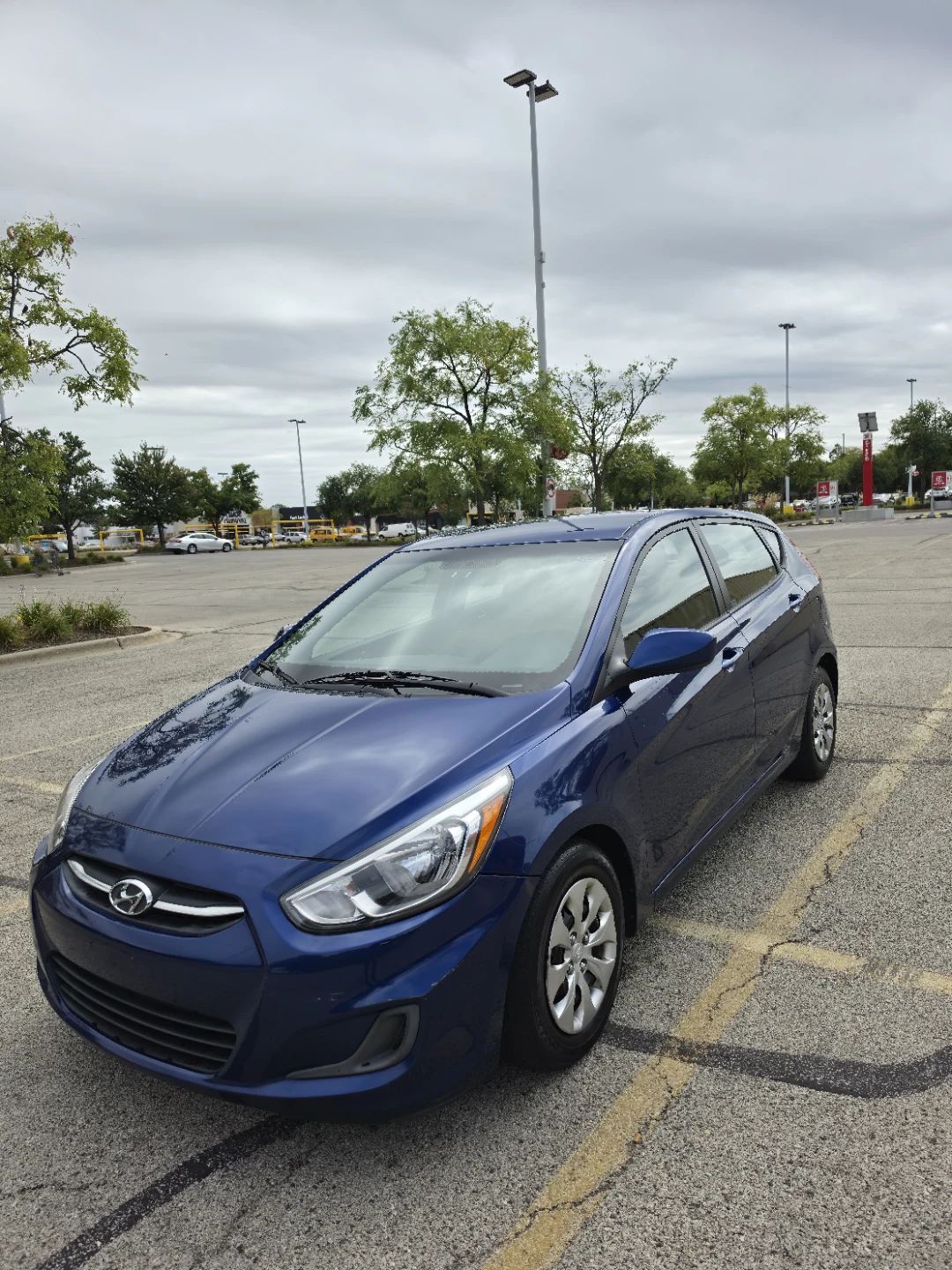 Blue Hyundai Accent Hatchback