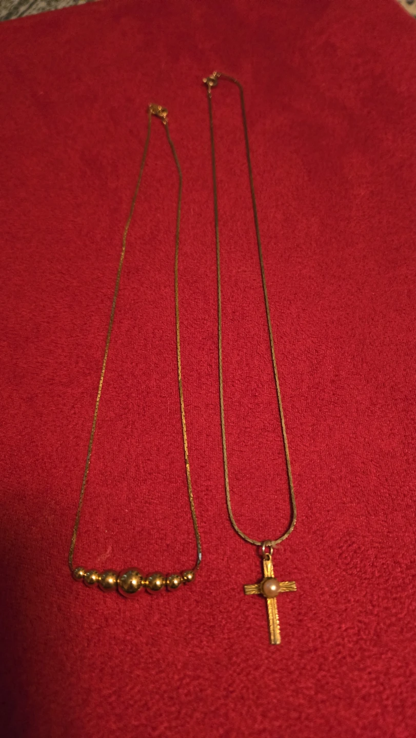 Two gold tone necklaces