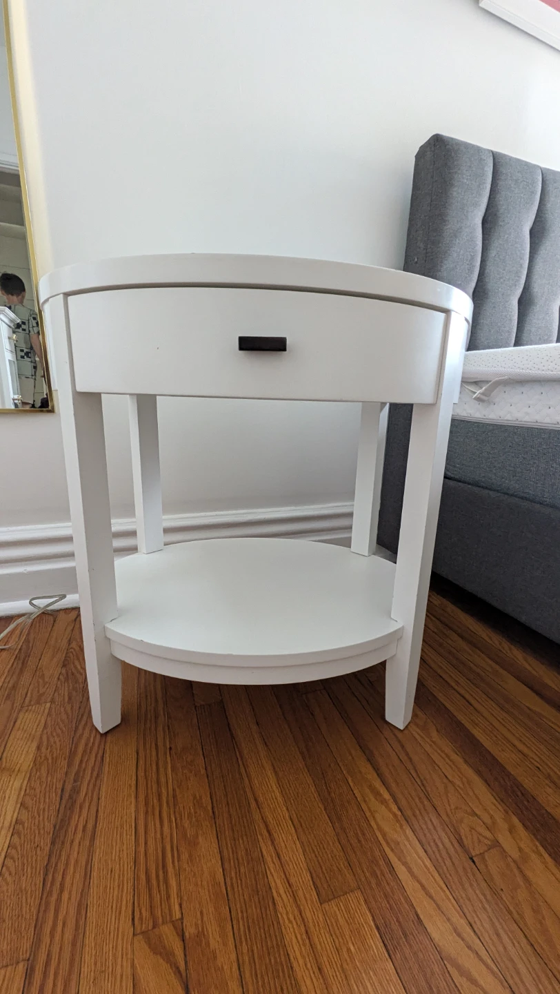 White oval nightstand with drawer