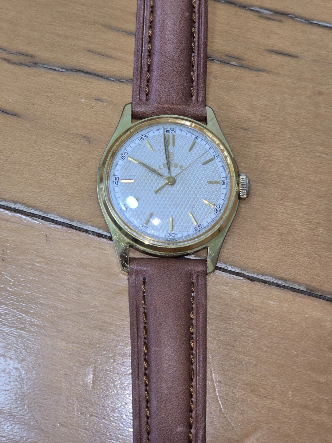 Vintage Leobe Gold-Tone Watch with Brown Leather Strap
