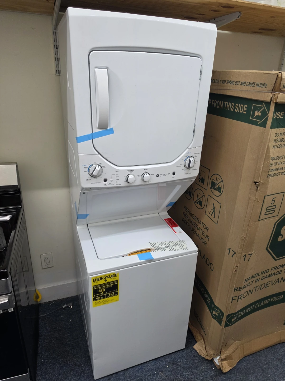 New GE 24in wide Stacked Washer and Dryer electric Unit