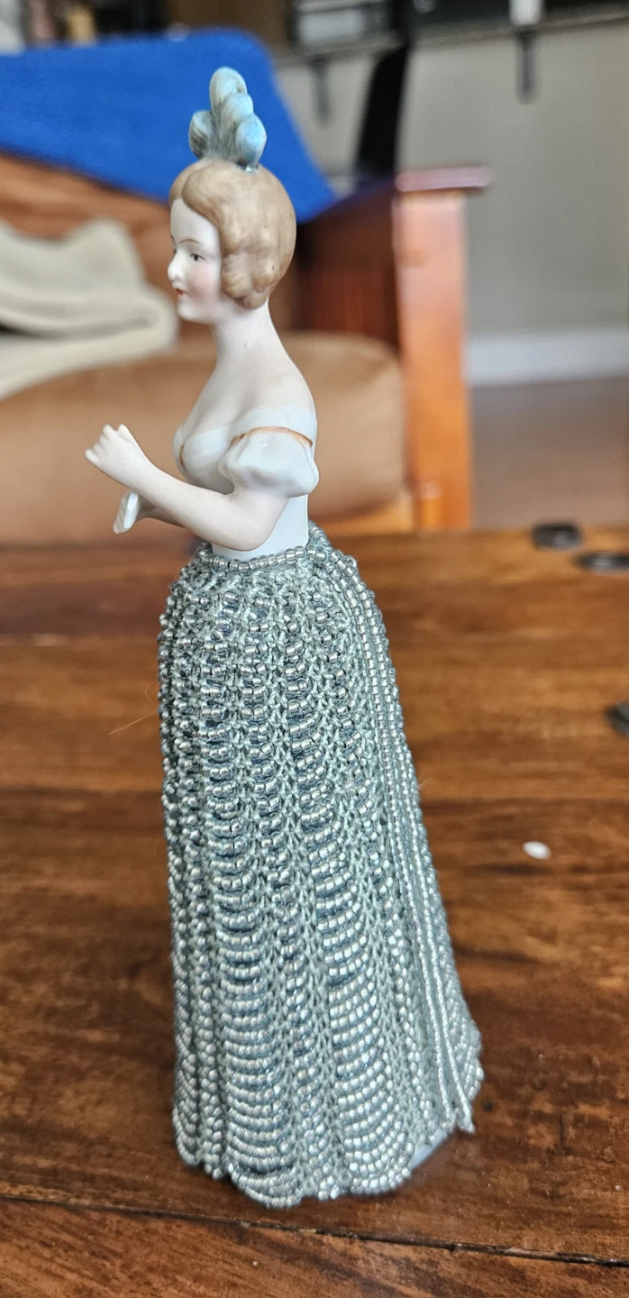 Porcelain Doll Figurine with Beaded Skirt