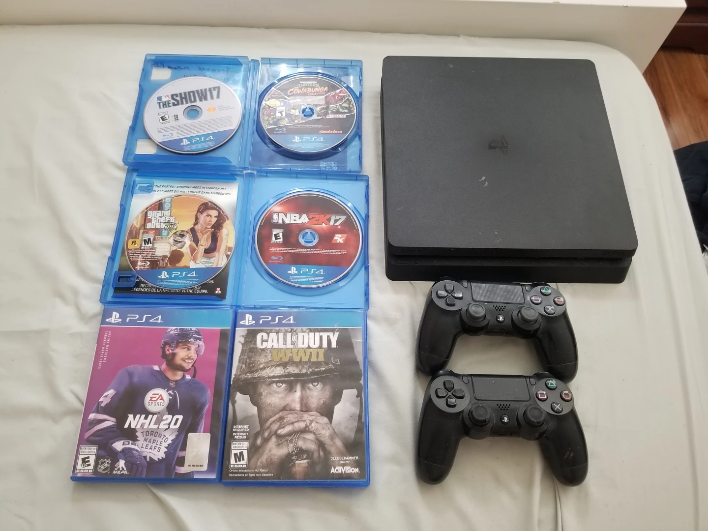 PS4 Console Bundle with 2 Controllers & 7 Games