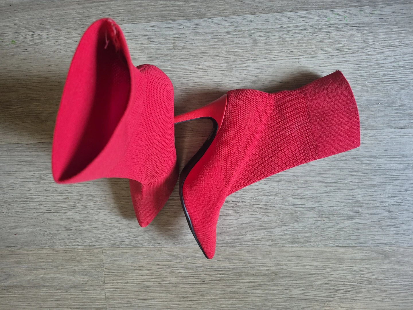 Brash red knit stiletto sock boots